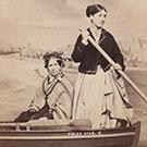 Two women in a fake rowing boat